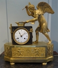 Picture of French Empire clock of Cupid Forging Arrows