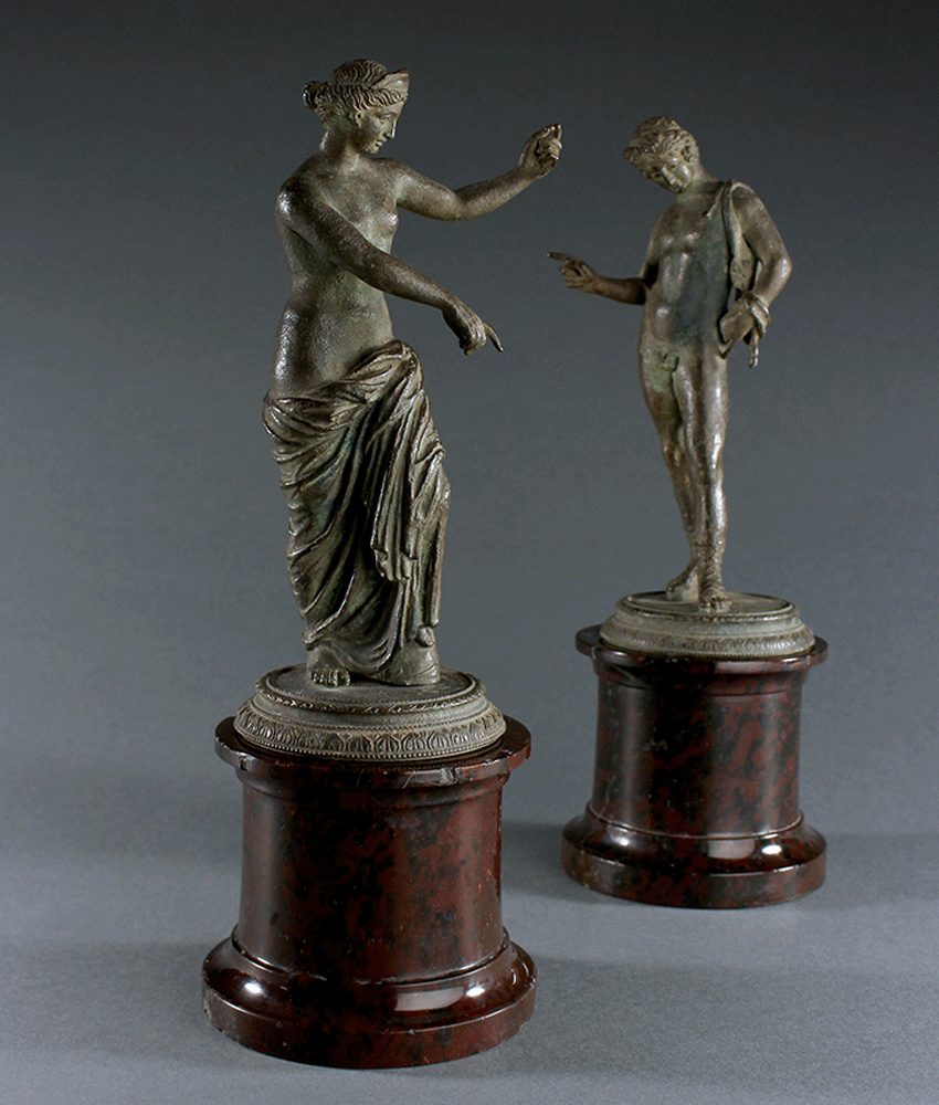 A bronze figure of Narcissus and the Venus Calipigia by Anonymous