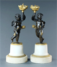 Picture of Pair of English Regency figural Cupid candlesticks