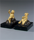 Picture of Pair of bronze and marble Putti paperweights