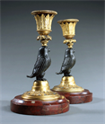 Picture of Rare pair of Empire style 'Retour d'Egypte' candlesticks