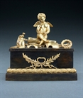 Picture of Rare Empire armorial cupid patinated and ormolu bronze encrier