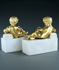 Picture of CA0352 Decorative pair of Louis XVI style gilt bronze reclining cupids on marble