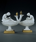 Picture of Decorative pair of biscuit porcelain figural oil lamps after Boizot