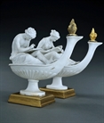Picture of CA0315 Decorative pair of biscuit porcelain figural oil lamps after Boizot