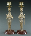 Picture of CA0181 Fascinating pair of Egyptian Revival candlesticks